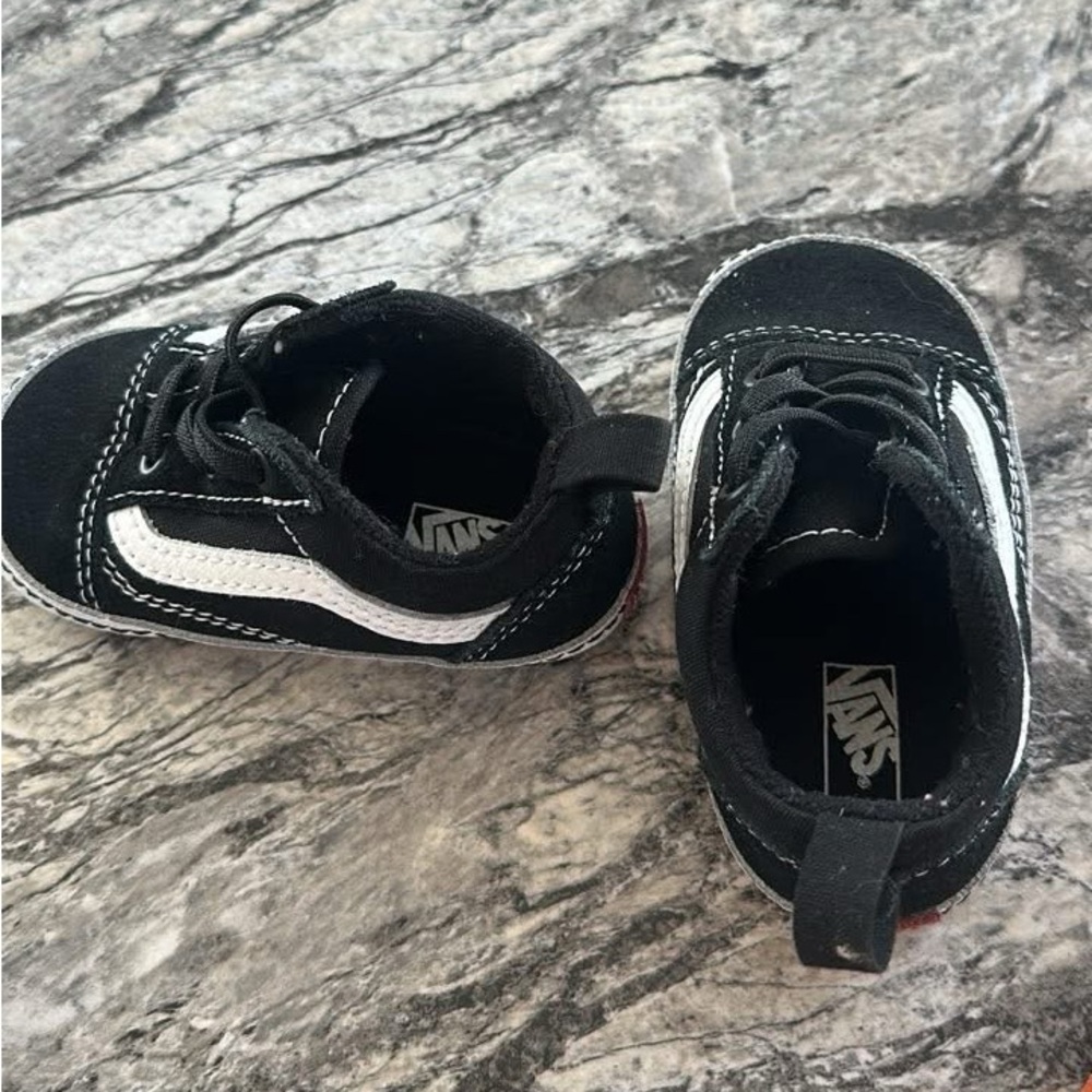 Jordan Kids Black and White 
Black & white soft vans shoes for babies